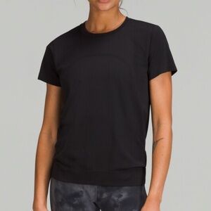 Black Lululemon Swiftly Waist Length Relaxed Fit Short-Sleeve (Size 6)